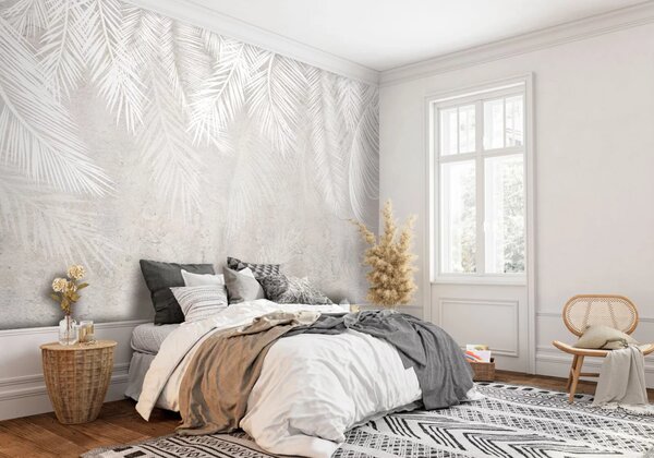 Bedroom with white and grey wallpaper with leaf motives