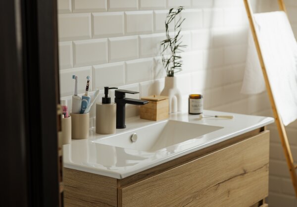 Wooden bathroom cabinet with a sink