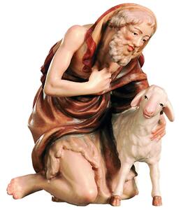 Kneeling shepherd with a lamb for the Nativity scene - Christmas