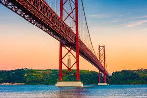 Photography 25th of April Bridge Lisbon Portugal at Sunset, © Allard Schager