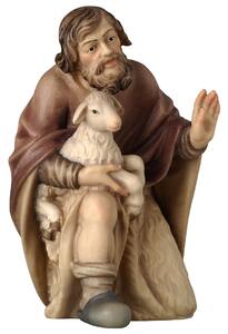 Shepherd kneeling with sheep - Folk