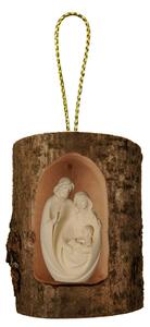 Holy family in wooden log
