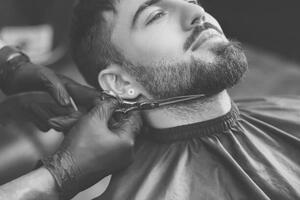 Photography Professional hairdresser working with bearded client, Liudmila Chernetska