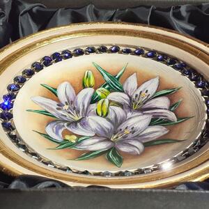Wooden bowl with lily Heliotrope