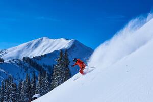 Photography Man skiing down steep snow covered, Jakob Helbig