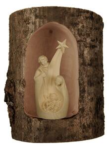 Holy family in wooden log wit comet