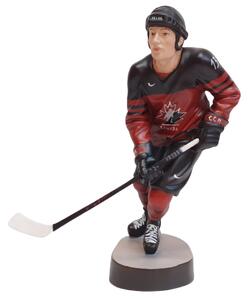 Wooden statue of a hockey player
