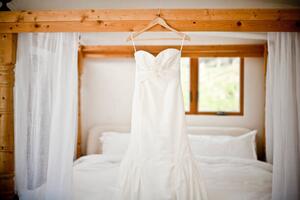 Art Photography Wedding dress hanging bed, Cavan Images, (40 x 26.7 cm)