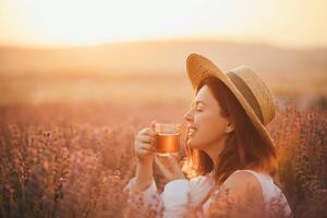 Photography Young happy woman drinking herbal tea,, Polina Lebed, (40 x 26.7 cm)