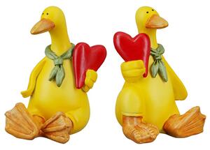 Ocala Polyresin Goose Gregor Sitting Sculpture In Yellow