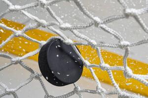 Photography Close-up of an Ice Hockey puck, cmannphoto