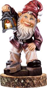 Gnome guardian on a wooden pedestal