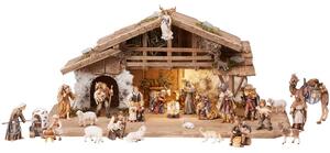 Wooden Alpine stable Rainell with lighting and 29 figurines