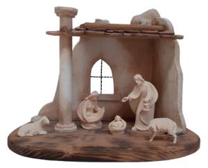 Wooden Nativity scene of the Holy Family with sheep