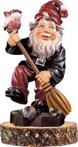 Gnome with a broom wooden pedestal