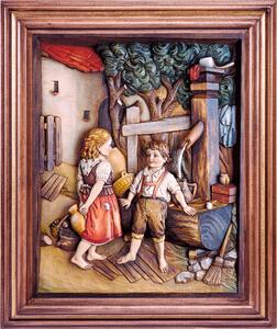 Wooden picture of children at the well