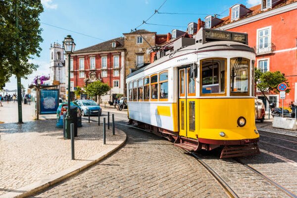 Photography Old yellow tram on the streets, © Marco Bottigelli