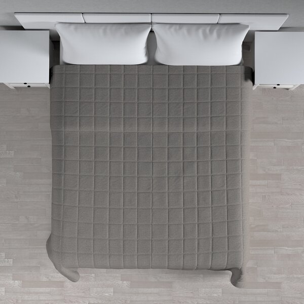 Check quilted throw