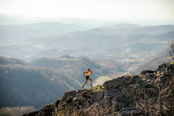 Photography Woman running on mountain, miljko