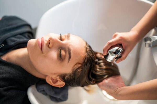 Photography Young women customer washing her hair, Nitat Termmee