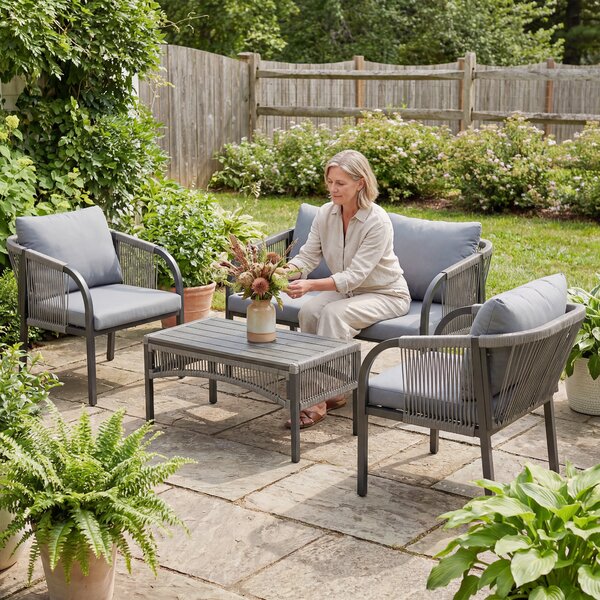 Outsunny 4 Piece Rattan Garden Furniture Set with Loveseat, Armchairs, Table, Steel Frame Wicker Patio Conversation Set, Grey