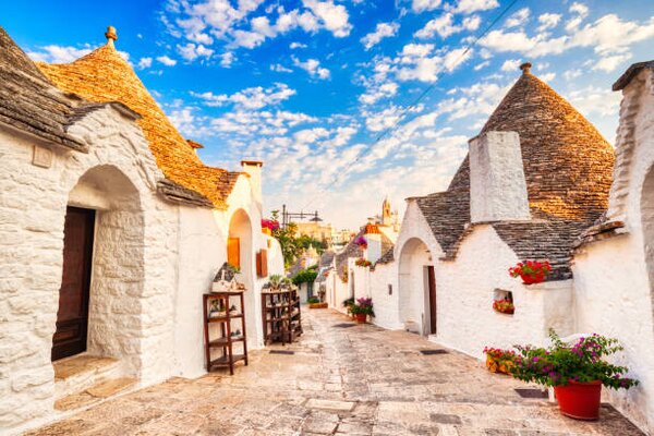 Photography Famous Trulli Houses during a Sunny, roman_slavik