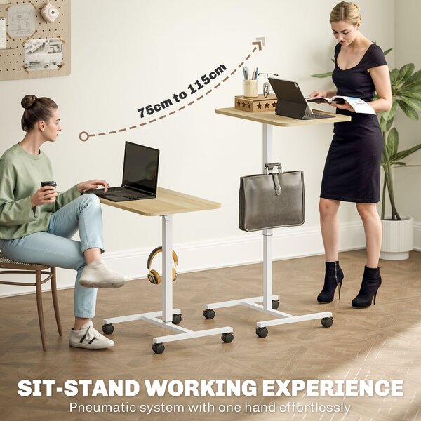 HOMCOM Height Adjustable Standing Desk, Pneumatic Sit Stand Desk for Laptop, Mobile Overbed Table with Wheels, Natural Wood Finish Aosom UK