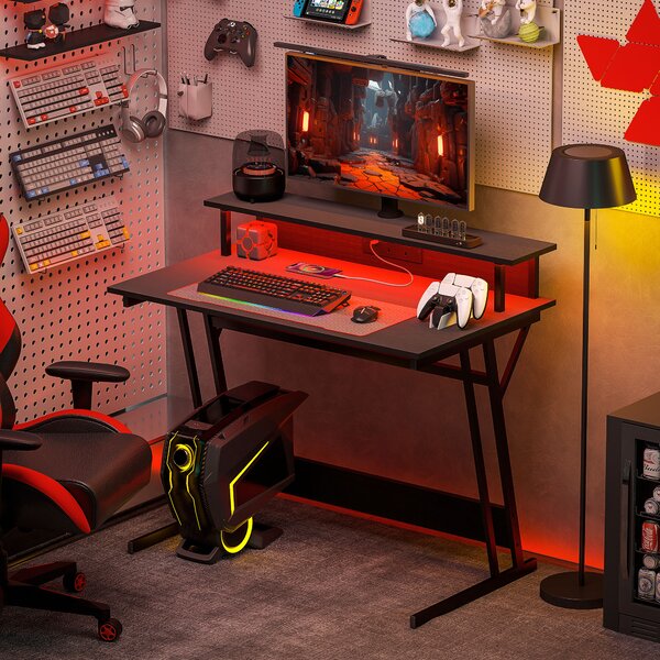HOMCOM Gaming Desk with LED Lights and Power Outlets, 100 x 60cm Z Shaped Computer Desk with Monitor Stand and Steel Frame for Home Office, Black