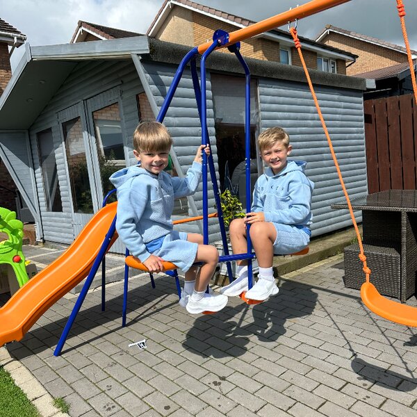 Outsunny 4 in 1 Metal Garden Swing Set with Double Swings Glider Slide Ladder Orange