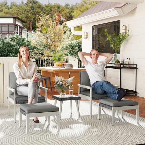 Outsunny 5 Pieces Rattan Garden Furniture Set, Patio Conversation Set with Cushions, Acacia Wood Top Coffee Table and Footstools, Outdoor Table and Chairs for Balcony, Terrace and Conservatory, Grey