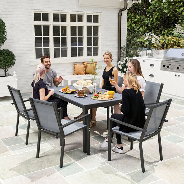 Outsunny 7 Pieces Garden Dining Set with Wood-plastic Composite Dining Table, and 6 Stackable Armchairs with Breathable Mesh Fabric