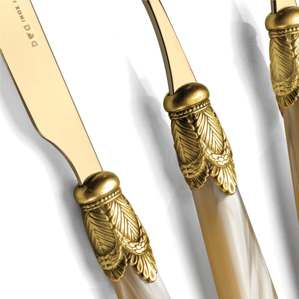 Ischia Ghiera Oro Anticato e Oro, one table setting, 4-piece cutlery set in polished 18/10 stainless steel thickness 2.5 with mother-of-pearl acrylic handle and Antique Gold metal ring