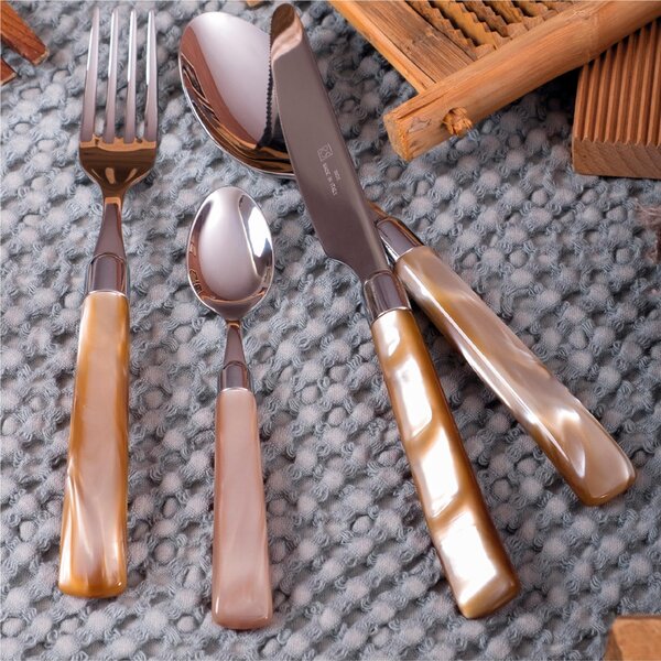 4-Piece GIADA Cutlery Set in 18/10 Stainless Steel with 2.5 mm Thick Champagne-Coloured Methacrylate Handle