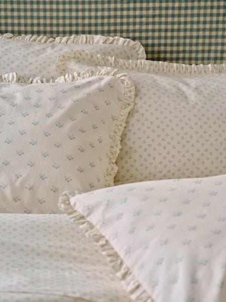 Mellow Green Martha Floral Cotton Frill Pillowcases (Pair) | Standard | Piglet in Bed