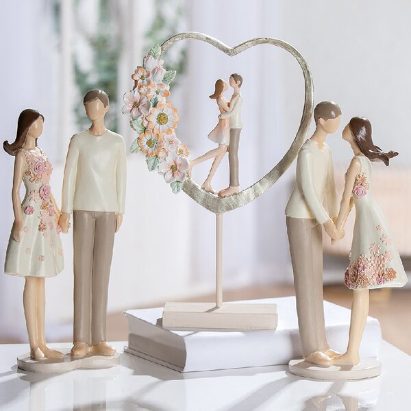 Carnation Synthetic Resin Couple Heart Sculpture In Multicolour