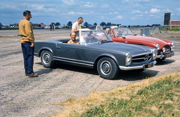 Photography Stirling Moss and Rob Walker 230sl at Silverstone, 1960
