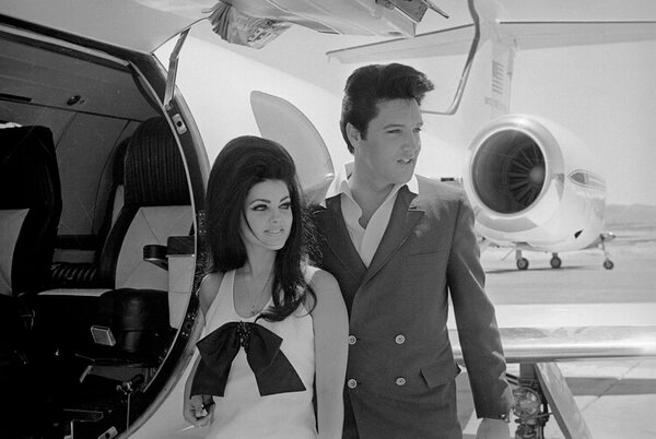 Photography Elvis and Priscilla Presley Posing near Airplane, Bettmann