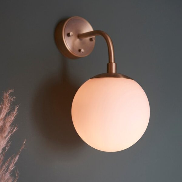 Orio 1 Light matt antique brass wall light with opal glass