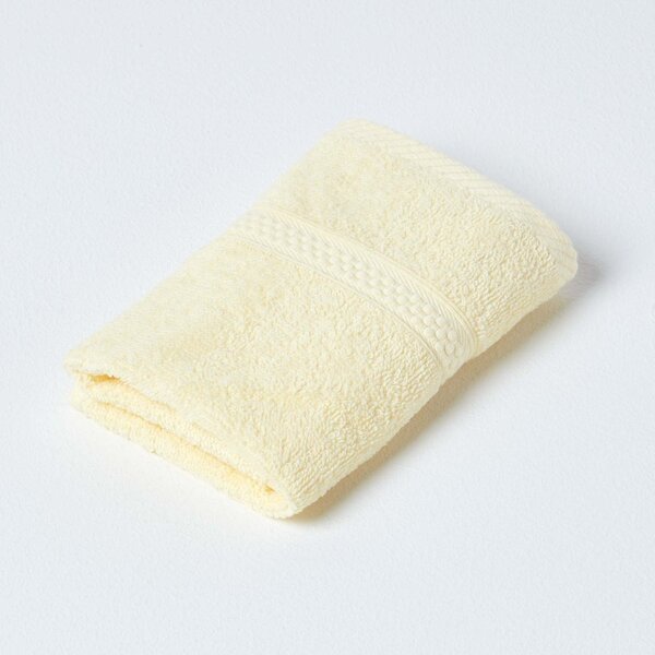 Homescapes Pastel Yellow Face Towel 100 % Turkish Cotton