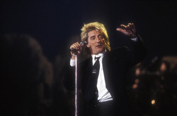 Photography Portrait of rock singer Rod Stewart on stage in 1990