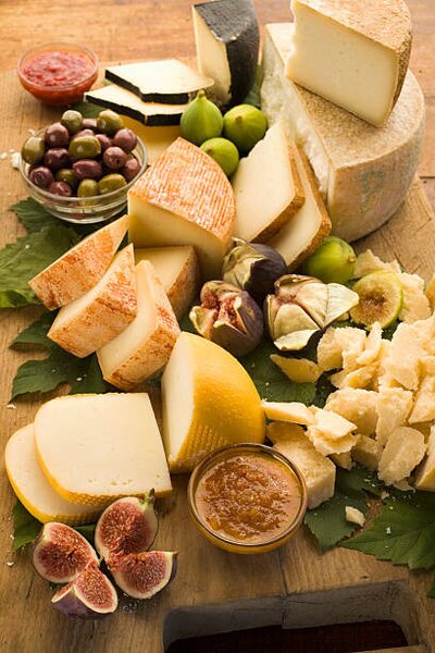 Photography Assorted Italian cheese with figs and olives, Jupiterimages